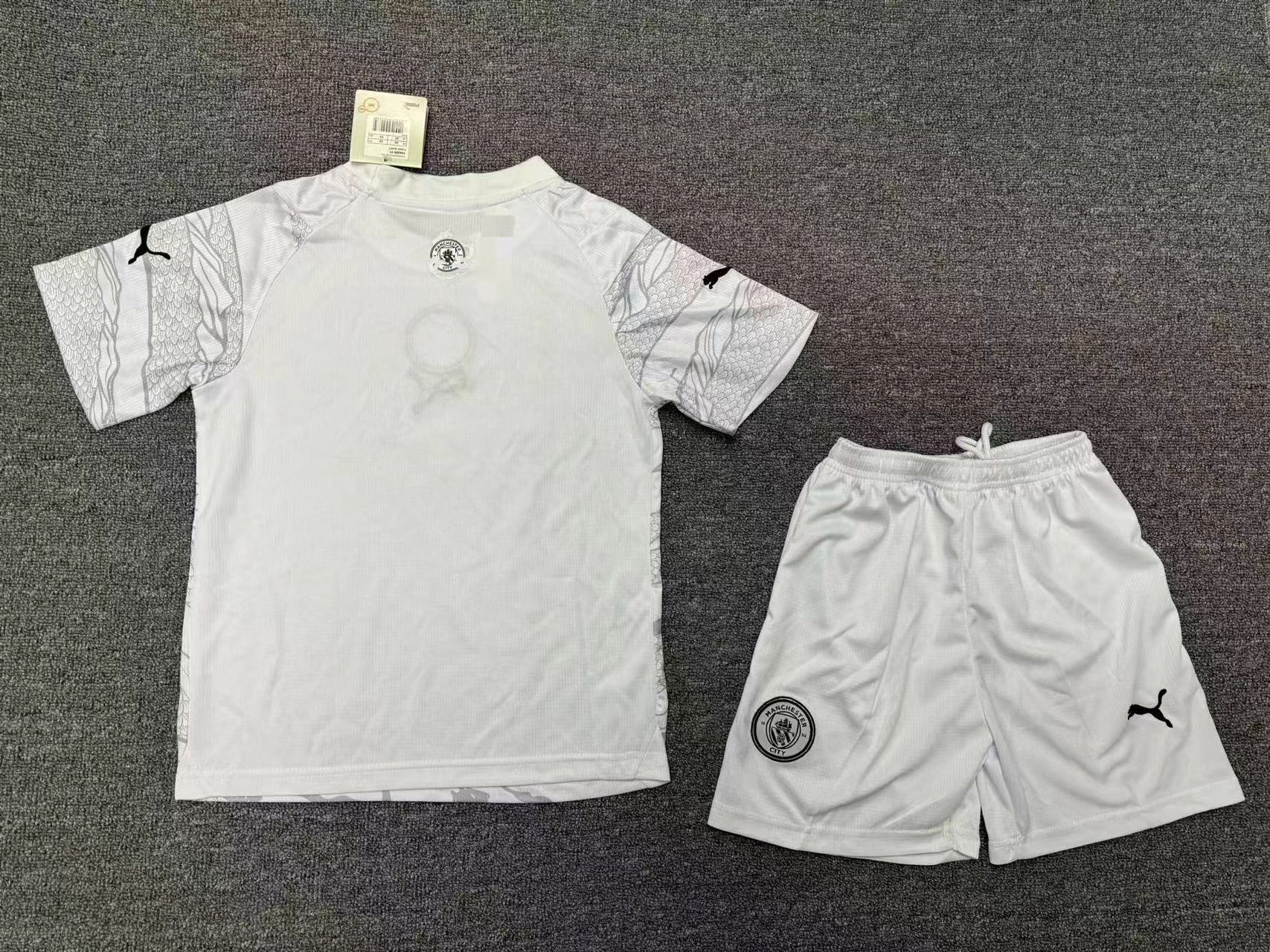 Manchester City Year Of The Dragon Kids Suit 23/24