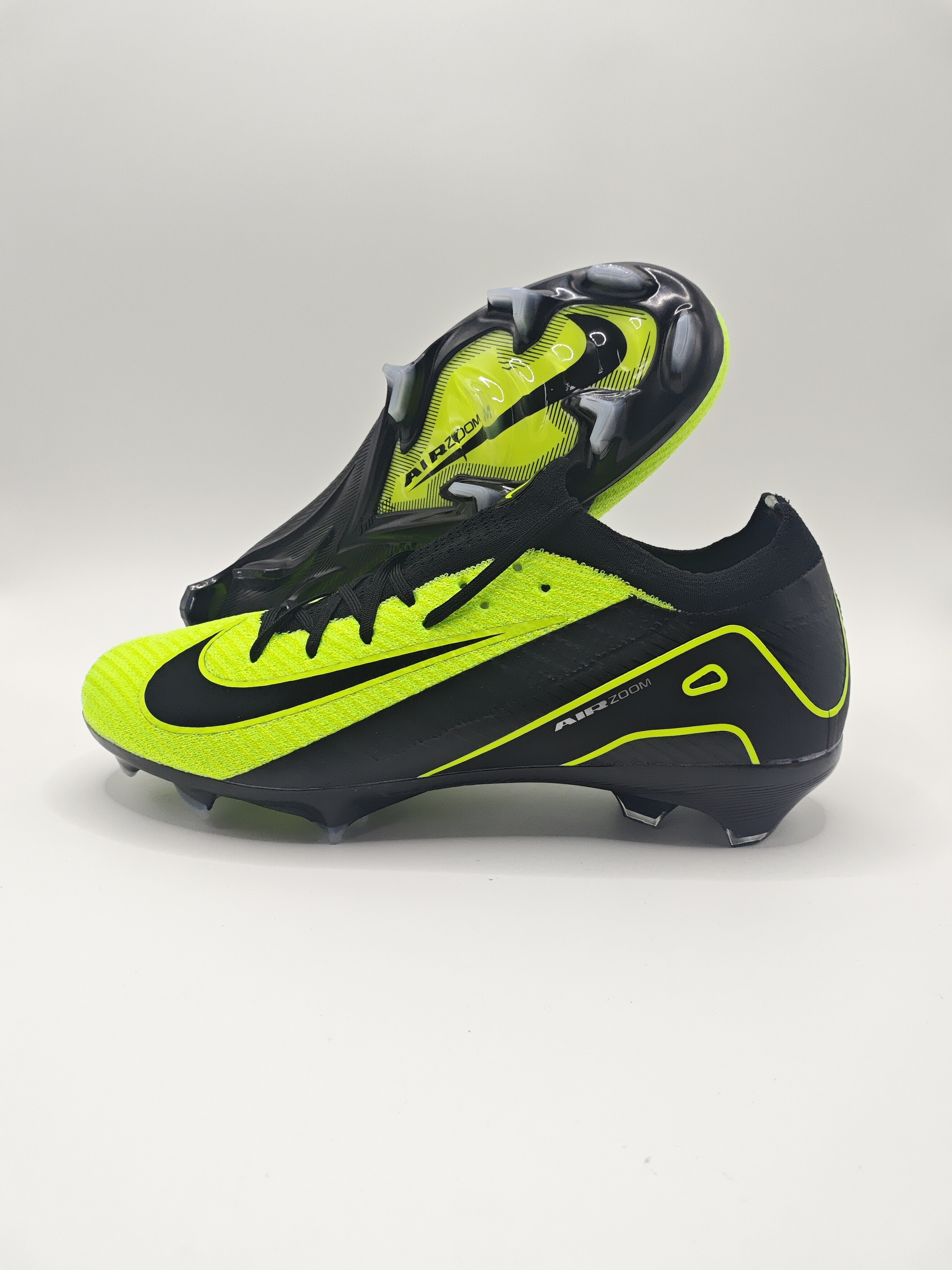 Nike Mercurial 16 FG Soccer Cleats with Built-in Bonded Pack: Full Air Cushion for All-Match Comfort, Waterproof Knit for Wet Pitches