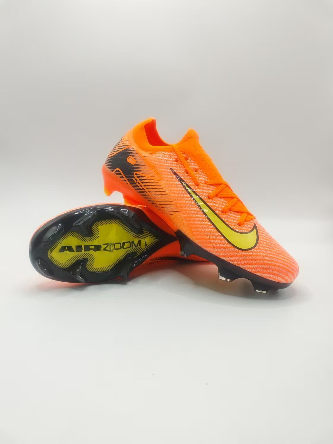 Nike Mercurial 16 FG Soccer Cleats with Built-in Bonded Pack: Full Air Cushion for All-Match Comfort, Waterproof Knit for Rainy Pitches