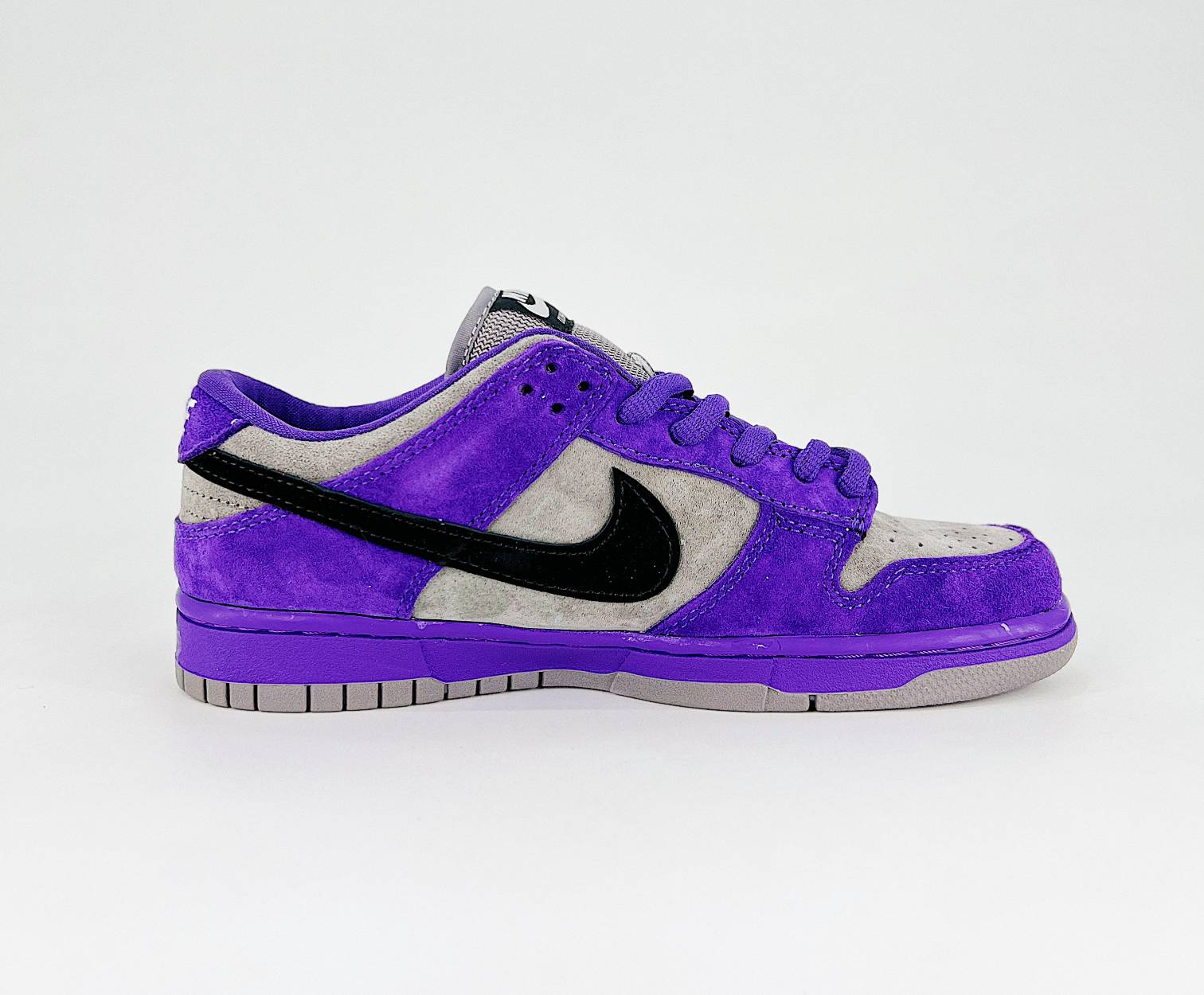 Supreme x Nike SB Dunk Low Pack Purple