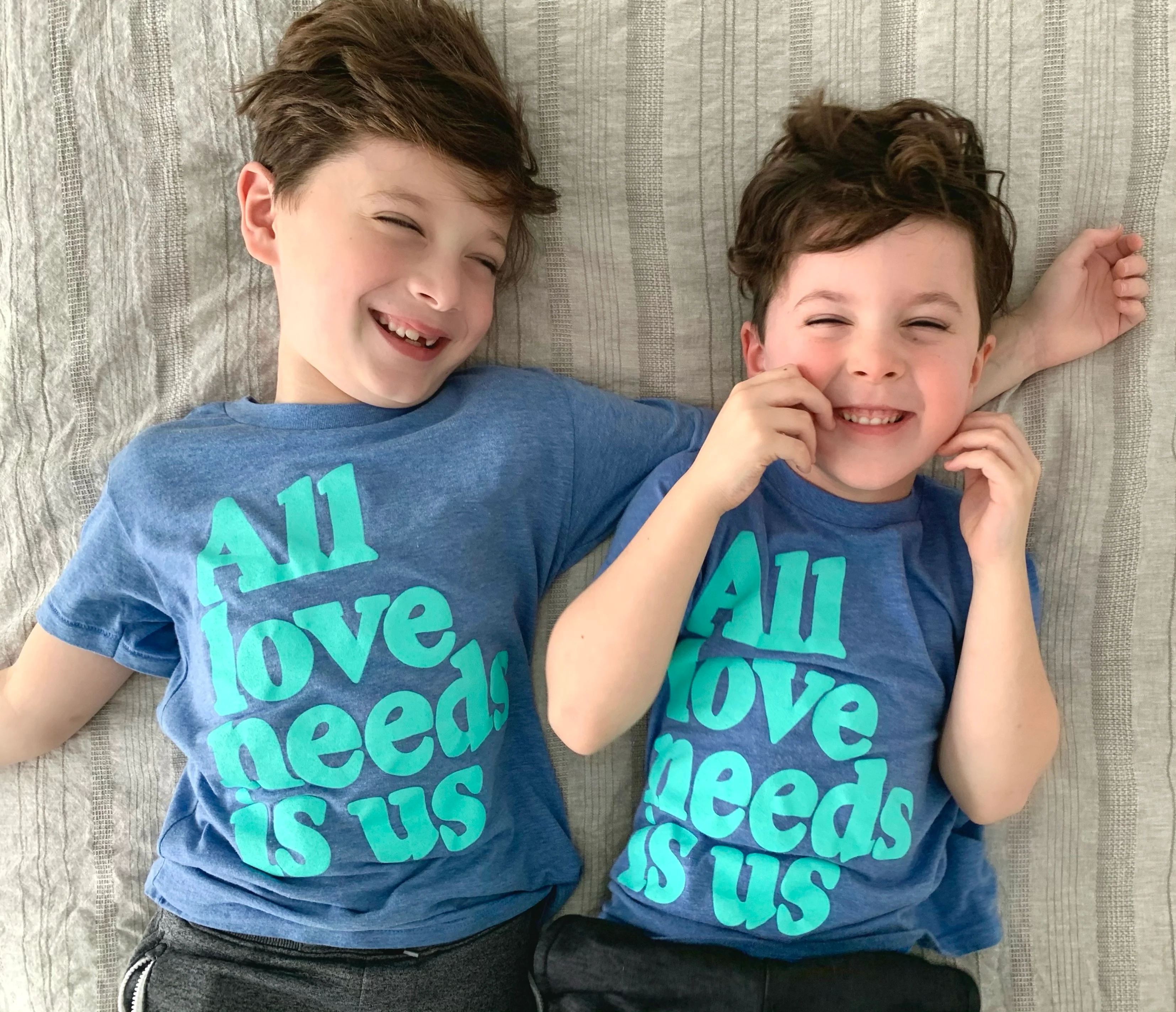 ALL LOVE NEEDS IS US KID T-SHIRT
