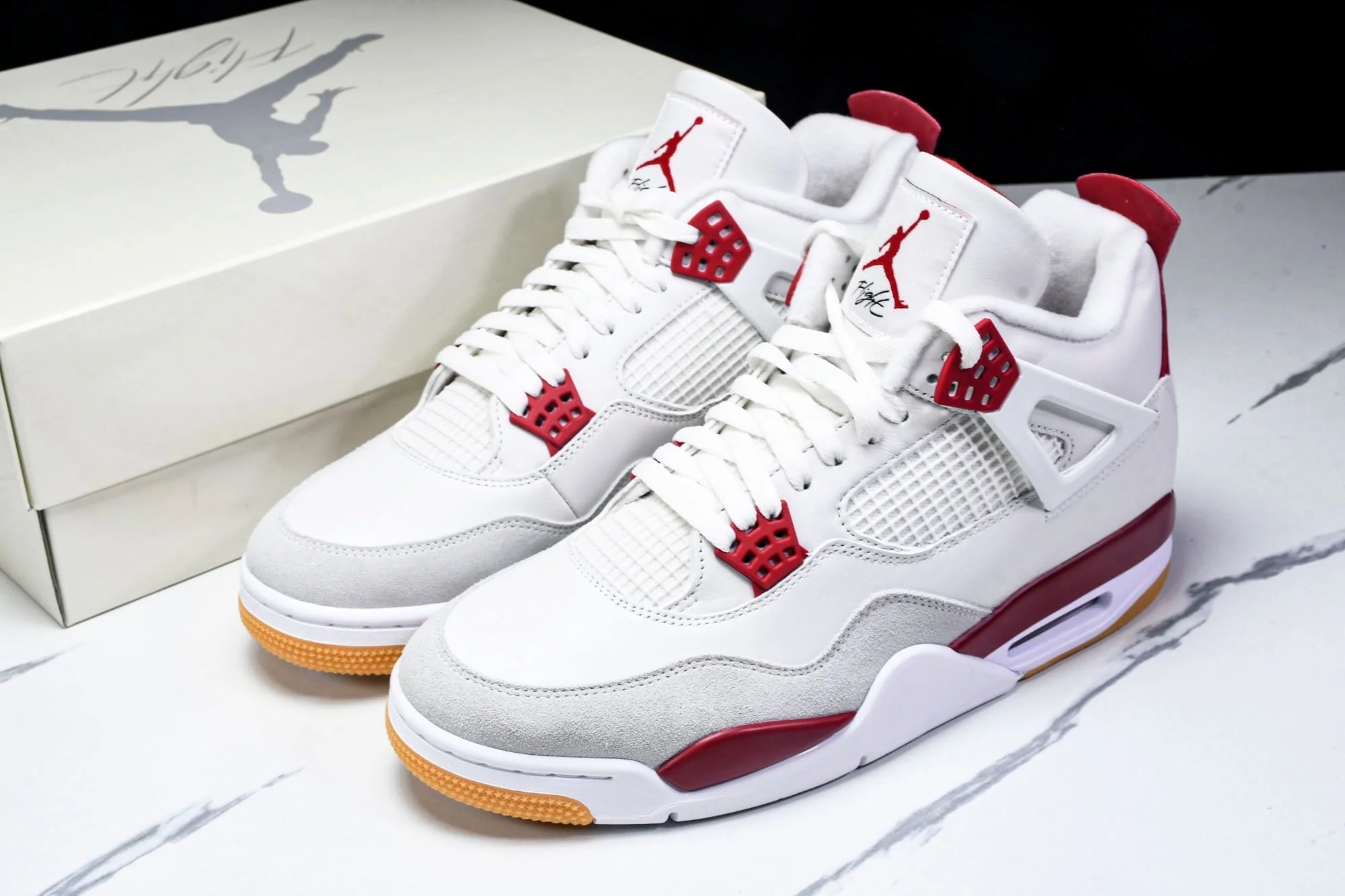 AJ4 Retro SB 'Varsity Red' (Friends & Family)