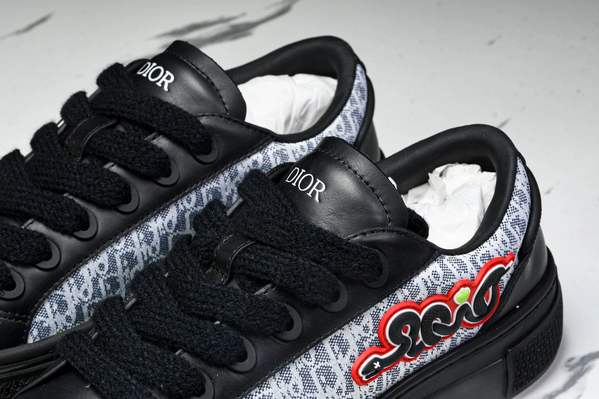 D1or x KAWS B33 Spin Sneaker 'Black'