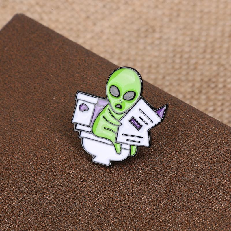 Reading Alien Enamel Pin